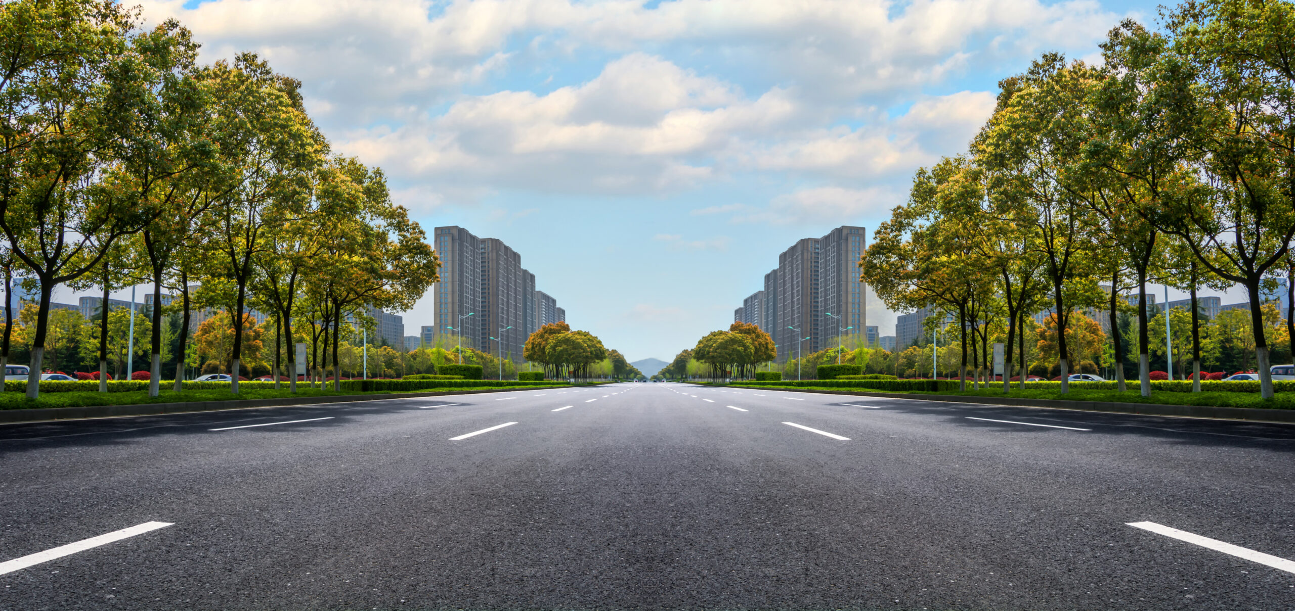 Asphalt road and modern city